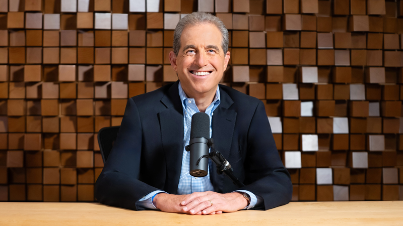 Image of Barry Wolf in podcast studio